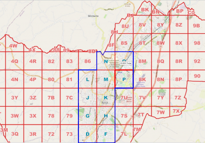 Detalhe da grade de Tunja com geocódigo logístico de 2 dígitos na área rural e 1 dígito na urbana, onde foram definidas células de overlay (contorno azul).
